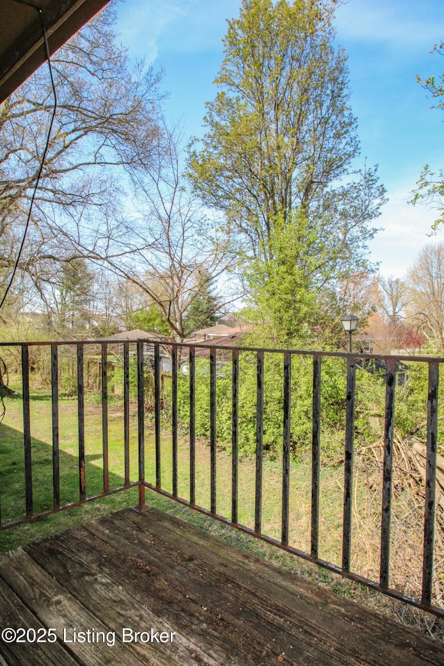 deck featuring a lawn