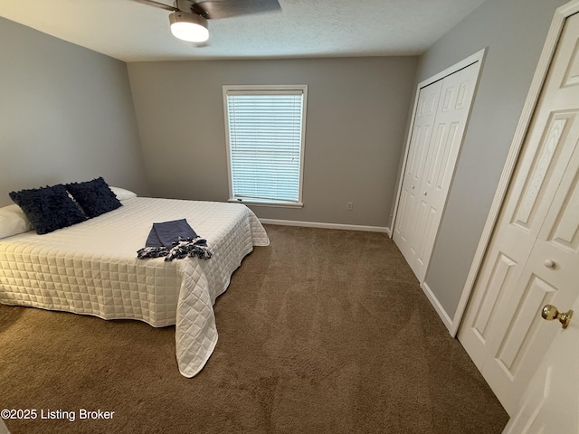 bedroom with baseboards, ceiling fan, and dark carpet