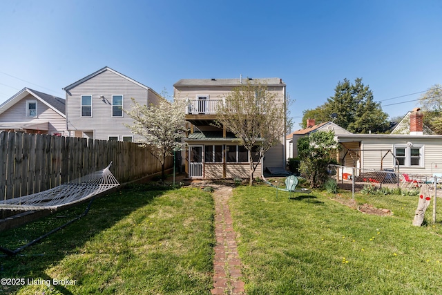 1035 Lydia St, Louisville, KY 40217 - rear view of house featuring a sunroom
