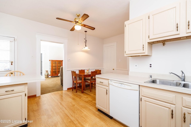 1035 Lydia St, Louisville, KY 40217 - kitchen with dishwasher, a sink, a ceiling fan, and light countertops