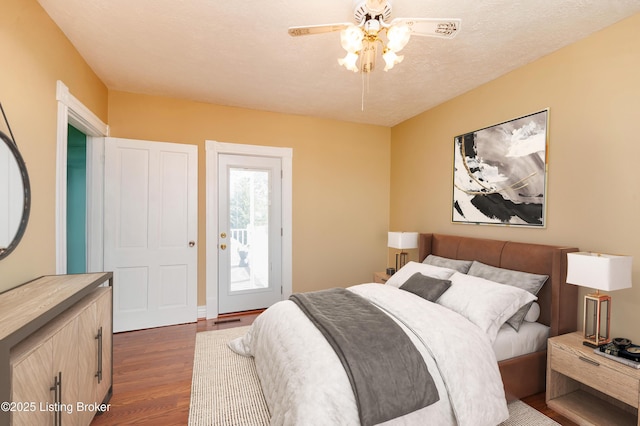 1035 Lydia St, Louisville, KY 40217 - bedroom featuring dark wood-style floors, access to outside, and ceiling fan