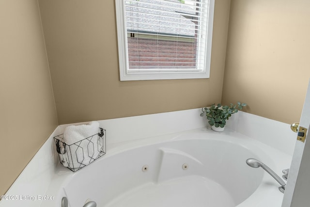 full bath featuring a jetted tub