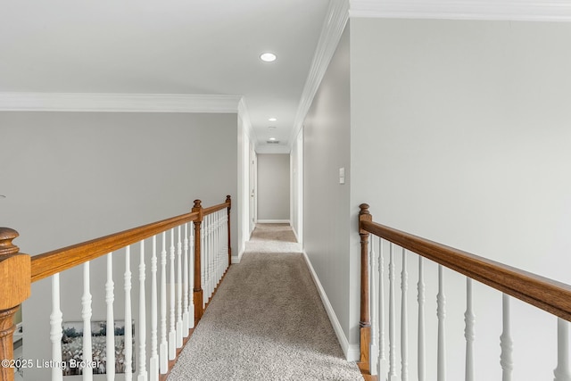 hallway featuring recessed lighting, carpet flooring, an upstairs landing, baseboards, and ornamental molding