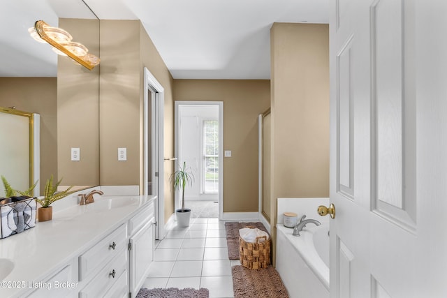 bathroom with a garden tub, a shower with shower door, tile patterned flooring, and vanity