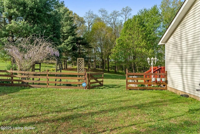 view of yard featuring fence