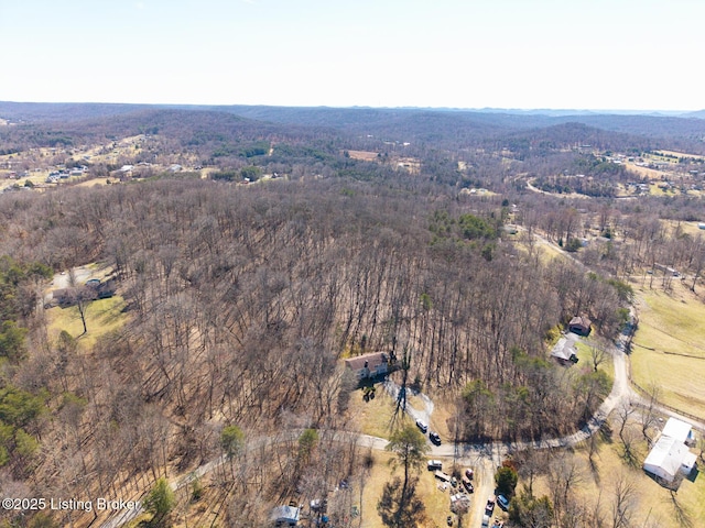 bird's eye view featuring a forest view