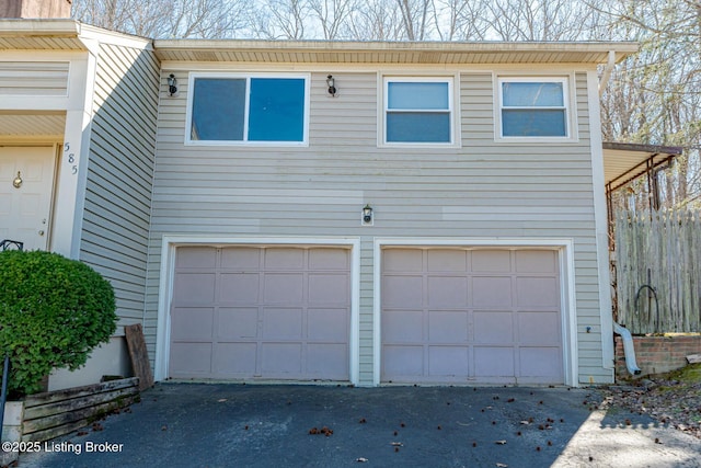 garage featuring driveway