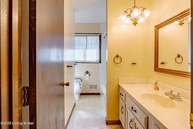 bathroom with toilet, baseboards, visible vents, a notable chandelier, and vanity
