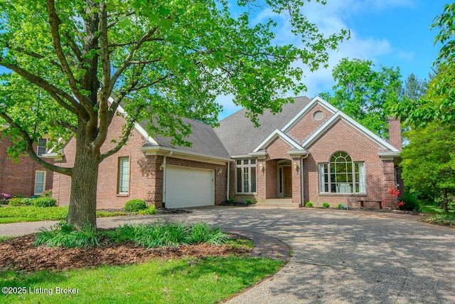 1038 Garden Creek Cir, Louisville, KY 40223 - traditional home with driveway, a garage, brick siding, and a chimney