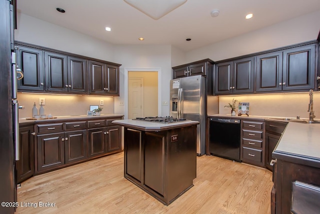 1038 Garden Creek Cir, Louisville, KY 40223 - kitchen with appliances with stainless steel finishes, a sink, light wood-type flooring, a center island, and recessed lighting