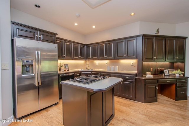 1038 Garden Creek Cir, Louisville, KY 40223 - kitchen featuring stainless steel appliances, a sink, light wood finished floors, dark brown cabinets, and recessed lighting