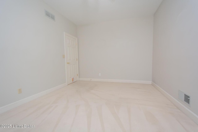 1038 Garden Creek Cir, Louisville, KY 40223 - spare room featuring light colored carpet and baseboards