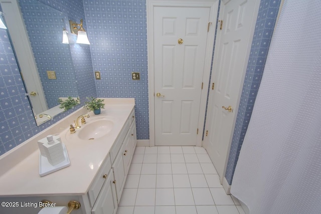 1038 Garden Creek Cir, Louisville, KY 40223 - bathroom with tile patterned floors, wallpapered walls, vanity, and baseboards