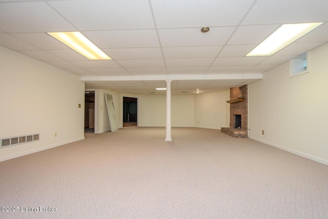 1038 Garden Creek Cir, Louisville, KY 40223 - finished basement featuring a fireplace, light colored carpet, a paneled ceiling, and baseboards