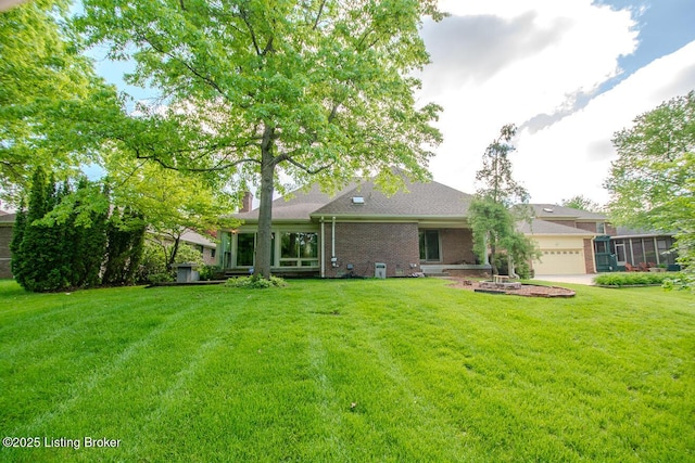 1038 Garden Creek Cir, Louisville, KY 40223 - rear view of property featuring brick siding and a lawn