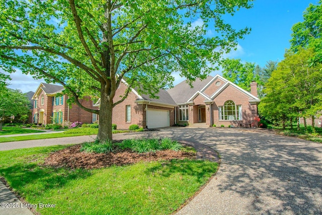 1038 Garden Creek Cir, Louisville, KY 40223 - view of front of house featuring curved driveway, an attached garage, brick siding, and a chimney