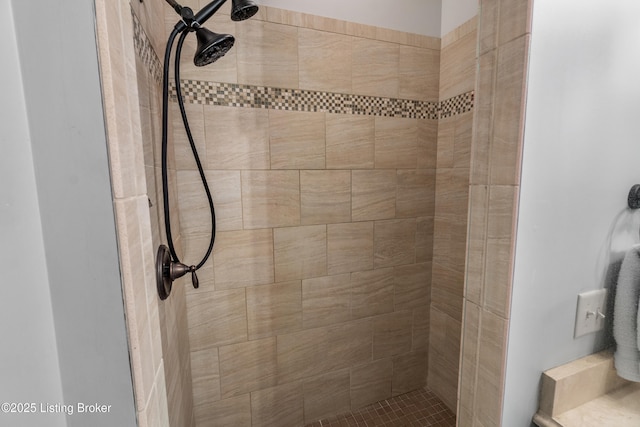 bathroom featuring tiled shower