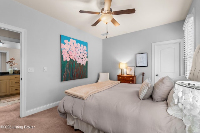 bedroom featuring light colored carpet, a ceiling fan, and baseboards