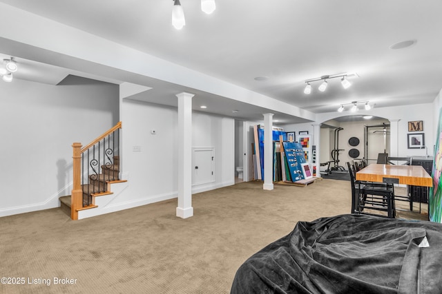 interior space featuring stairway, carpet floors, and baseboards