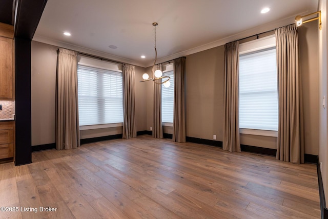 11004 Meeting St, Prospect, KY 40059 - unfurnished dining area featuring crown molding, light wood-style flooring, baseboards, a chandelier, and recessed lighting