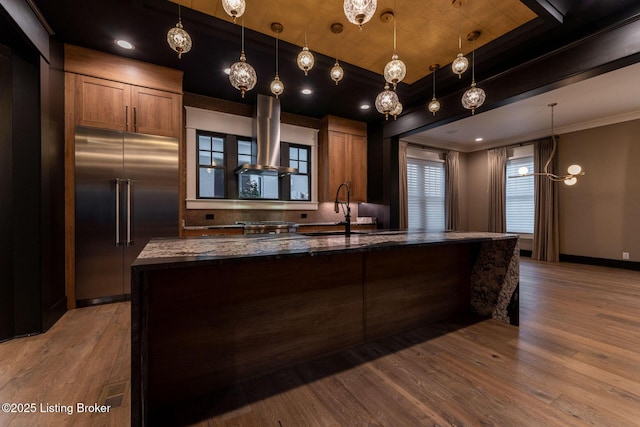 11004 Meeting St, Prospect, KY 40059 - kitchen with stainless steel built in fridge, dark stone countertops, wood finished floors, a sink, and wood ceiling