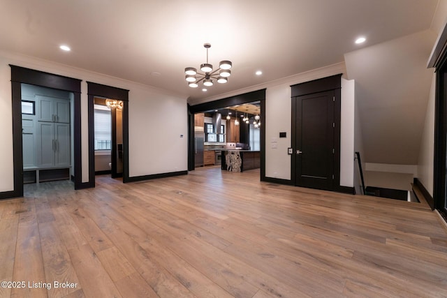 11004 Meeting St, Prospect, KY 40059 - unfurnished living room featuring a chandelier, crown molding, light wood finished floors, baseboards, and recessed lighting