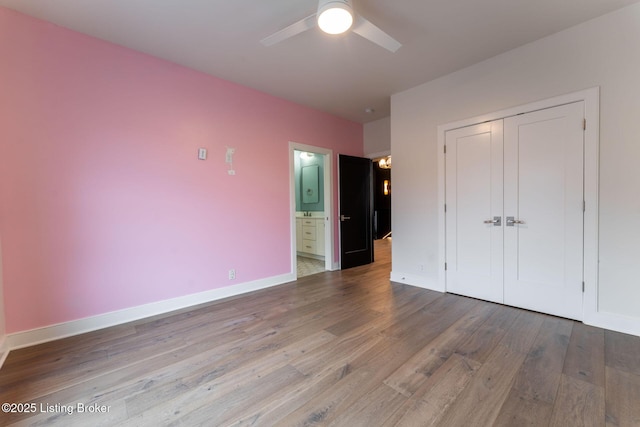 11004 Meeting St, Prospect, KY 40059 - unfurnished bedroom with wood finished floors, baseboards, a closet, connected bathroom, and ceiling fan