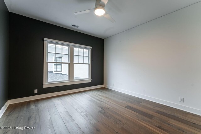 11004 Meeting St, Prospect, KY 40059 - empty room featuring dark wood-type flooring, a ceiling fan, and baseboards