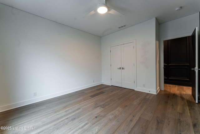11004 Meeting St, Prospect, KY 40059 - unfurnished bedroom with wood finished floors, baseboards, a closet, and ceiling fan