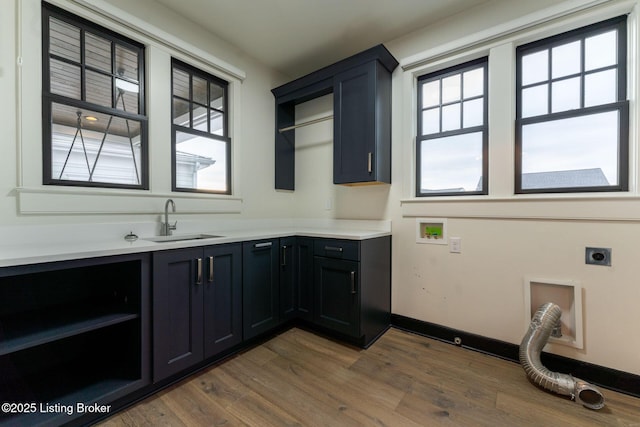 11004 Meeting St, Prospect, KY 40059 - clothes washing area with electric dryer hookup, cabinet space, wood finished floors, and baseboards