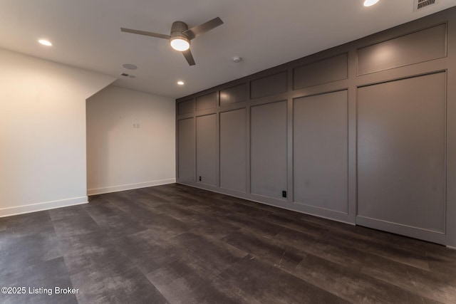11004 Meeting St, Prospect, KY 40059 - unfurnished bedroom with a decorative wall, baseboards, recessed lighting, dark wood-style flooring, and ceiling fan