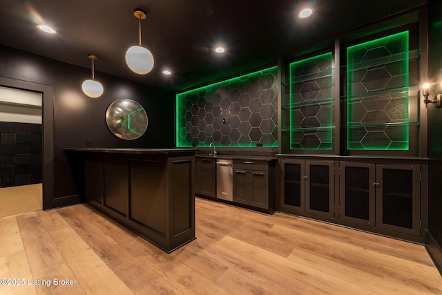 11004 Meeting St, Prospect, KY 40059 - bar featuring light wood-style floors, tasteful backsplash, dishwasher, recessed lighting, and a sink