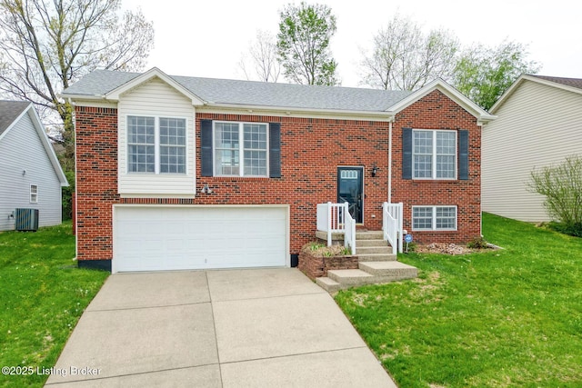 split foyer home featuring brick siding, cooling unit, concrete driveway, and an attached garage