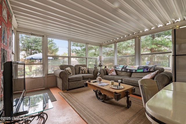 sunroom with plenty of natural light