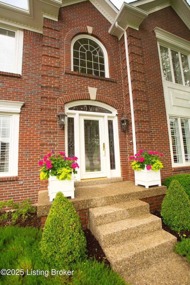 1304 Isleworth Dr, Louisville, KY 40245 - view of exterior entry featuring brick siding