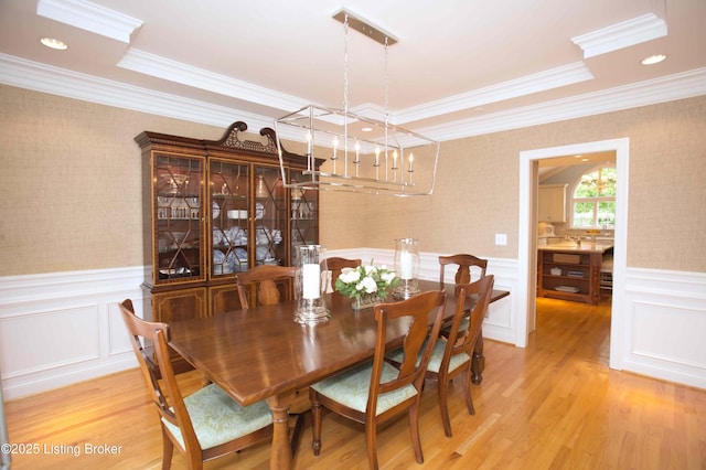 1304 Isleworth Dr, Louisville, KY 40245 - dining area with crown molding, wallpapered walls, a wainscoted wall, light wood finished floors, and a chandelier