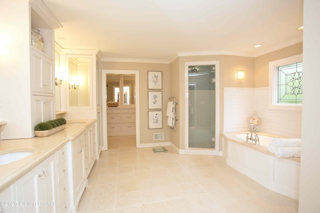 1304 Isleworth Dr, Louisville, KY 40245 - full bath featuring a shower stall, a garden tub, crown molding, vanity, and tile patterned floors