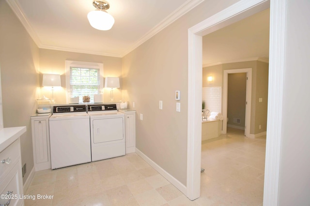 1304 Isleworth Dr, Louisville, KY 40245 - laundry room featuring separate washer and dryer, crown molding, cabinet space, and baseboards