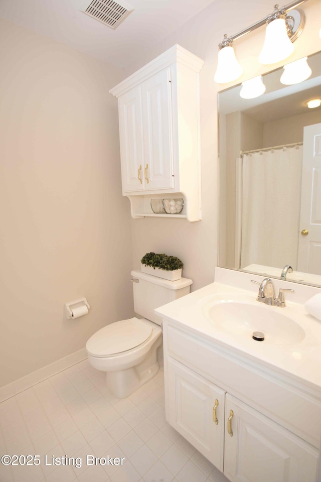 1304 Isleworth Dr, Louisville, KY 40245 - bathroom featuring tile patterned floors, toilet, and vanity