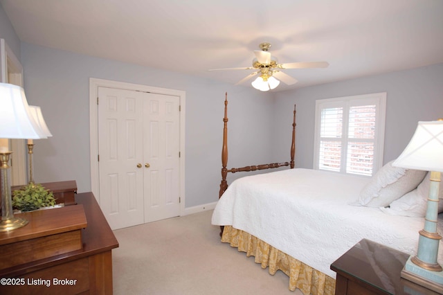 1304 Isleworth Dr, Louisville, KY 40245 - bedroom featuring a closet, light carpet, and a ceiling fan