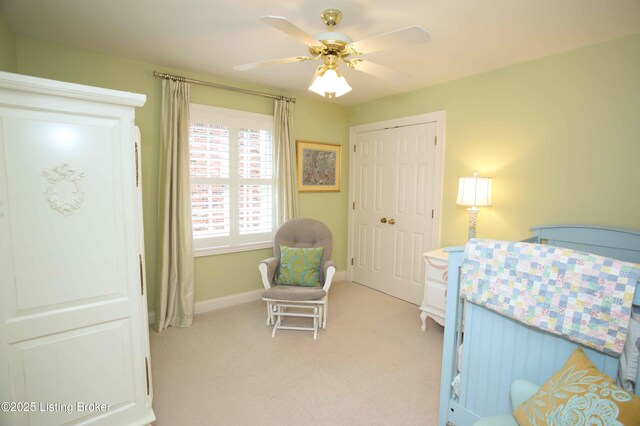 1304 Isleworth Dr, Louisville, KY 40245 - bedroom with light carpet, a ceiling fan, baseboards, and a closet