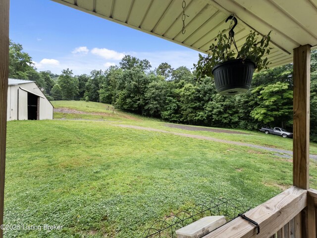 970 Elk Cave Branch Rd, Gravel Switch, KY 40328 - view of green lawn with an outdoor structure