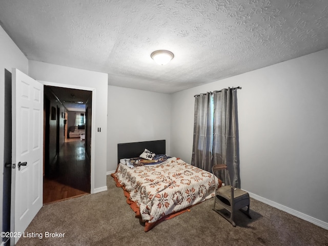 970 Elk Cave Branch Rd, Gravel Switch, KY 40328 - carpeted bedroom with a textured ceiling and baseboards