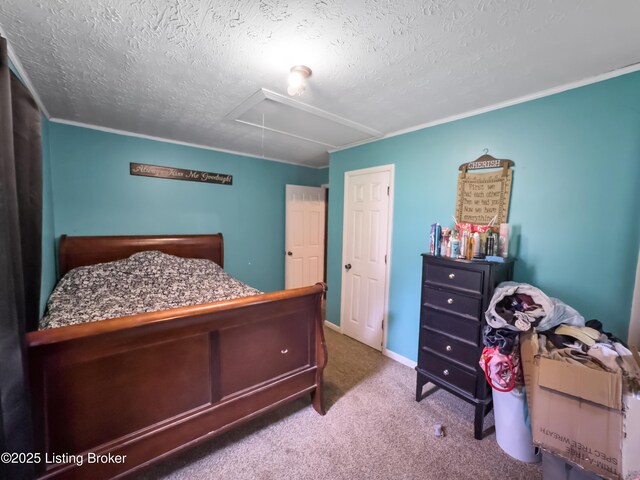 970 Elk Cave Branch Rd, Gravel Switch, KY 40328 - carpeted bedroom featuring attic access, a textured ceiling, and ornamental molding