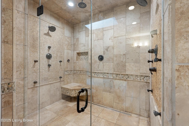 full bathroom with recessed lighting and tiled shower