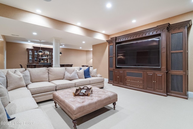 living room with recessed lighting, bar, and light colored carpet