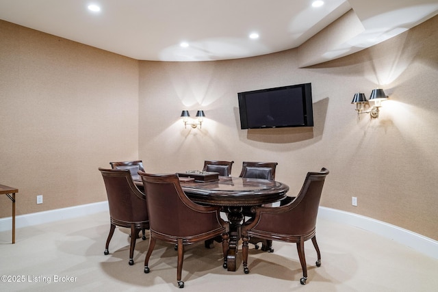 dining room with recessed lighting and baseboards