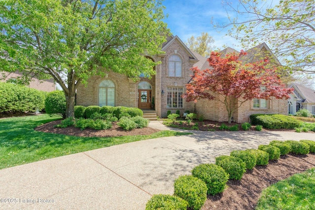 traditional-style house with brick siding