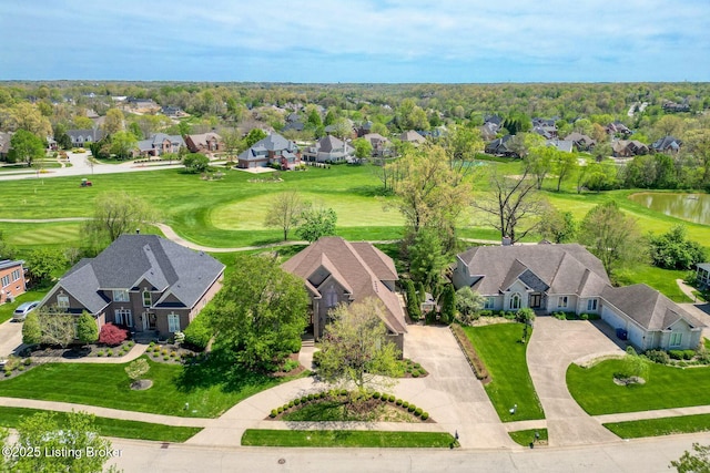 birds eye view of property with a water view and a residential view