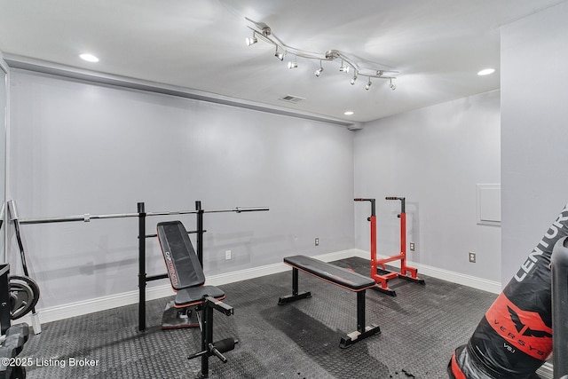 workout area with baseboards, visible vents, and recessed lighting